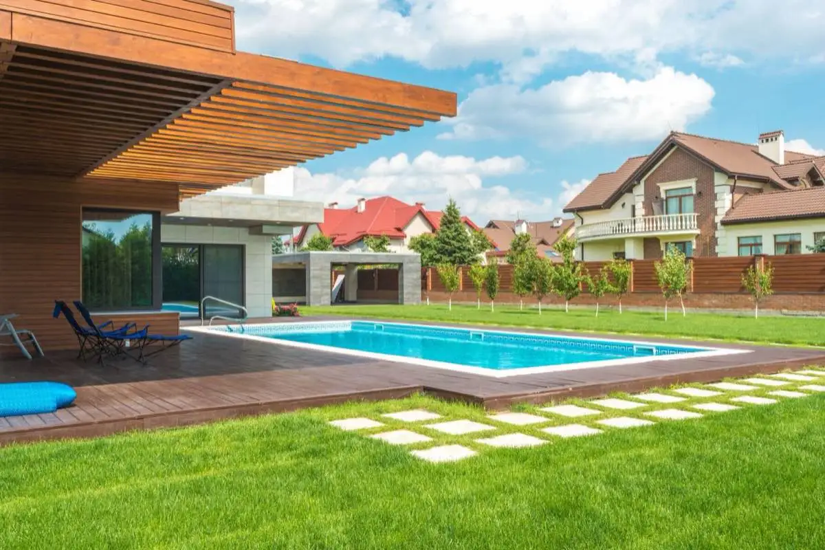 Pebble interior finish on a backyard swimming pool in Brownsville, TX
